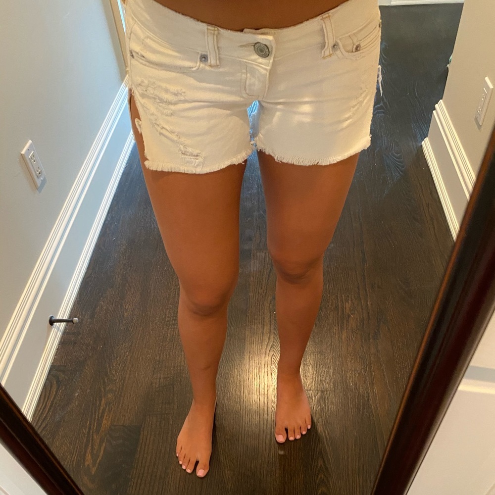 American eagle white shorts with side slits.